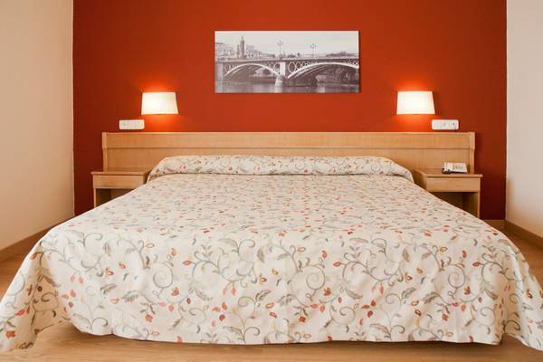 HABITACIÓN CON CAMA EXTRAGRANDE Hotel TRH La Motilla Business & Cultural en Dos Hermanas HABITACIÓN CON CAMA EXTRAGRANDE Hotel TRH La Motilla Business & Cultural en Dos Hermanas